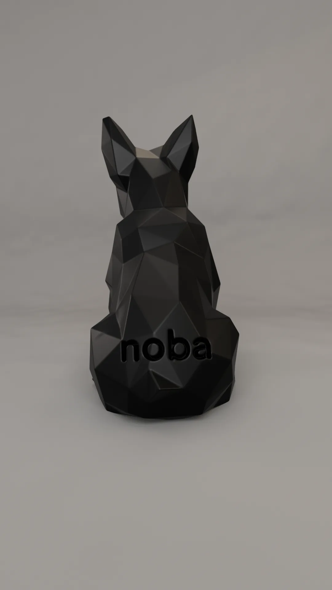 Black dog sculpture with name